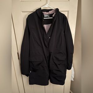 Athleta black, lined hooded rain jacket, car coat length. Great pockets.